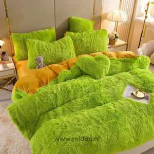 Green soft teddy fleece bedding set with included heart pillow and complete sheets