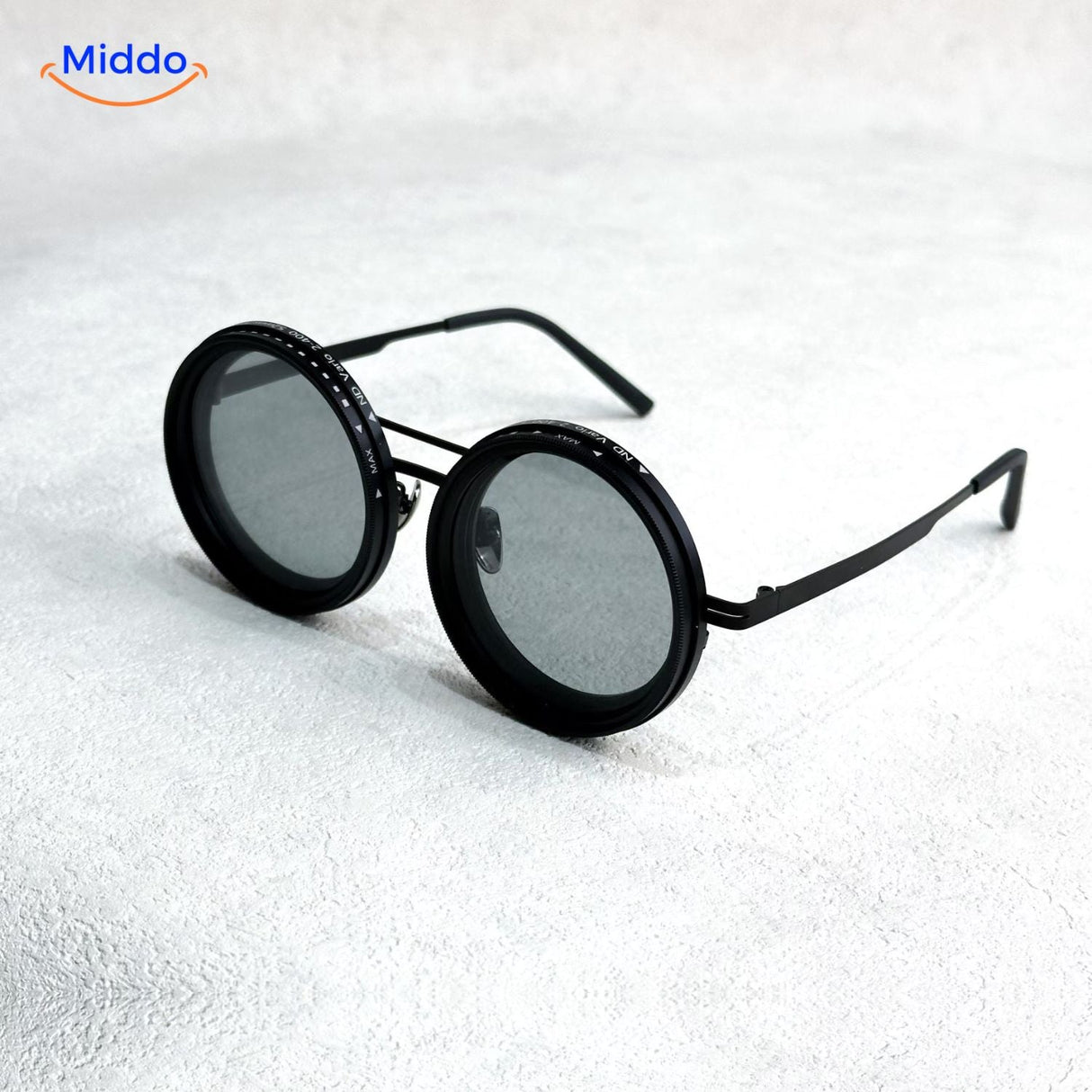 Black sunglasses with premium metal frame and polarized UV lens coating.