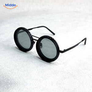 Black sunglasses with premium metal frame and polarized UV lens coating.
