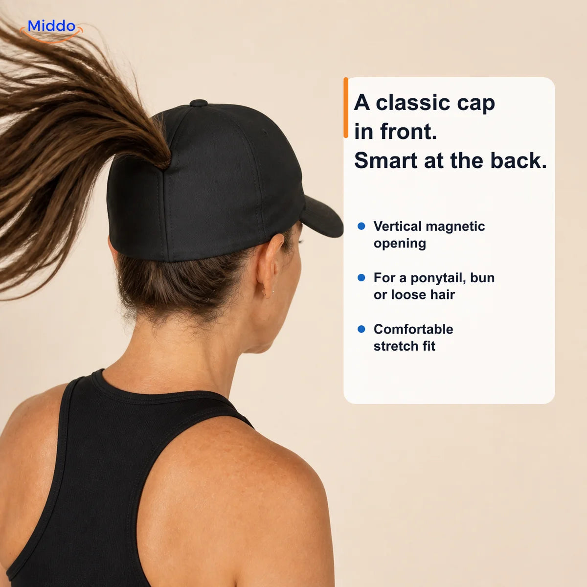 Woman with brown hair shows the closed seam below the ponytail of a black Ponylite cap