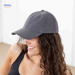 Dark gray ponytail cap featuring high hair opening with stylish magnetic closure.