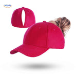Hot pink ponytail cap with high hair opening for secure ponytail fit.