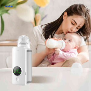 Portable USB bottle warmer held by a mother as she gives her baby a warm milk bottle