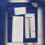 Portable red light therapy pen with charger, ideal for convenient on-the-go skincare.