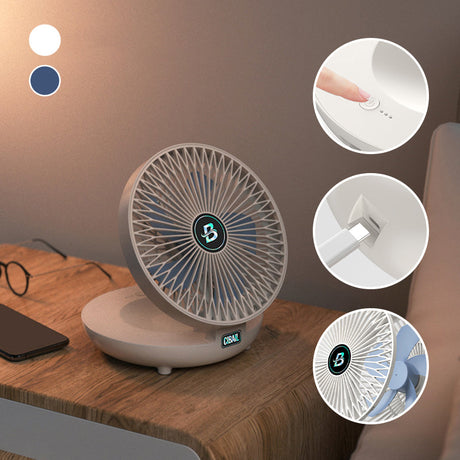 Portable cooling fan in bedroom for comfortable quiet sleep conditions.