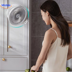 Portable cooling fan running in kitchen for effective air circulation.