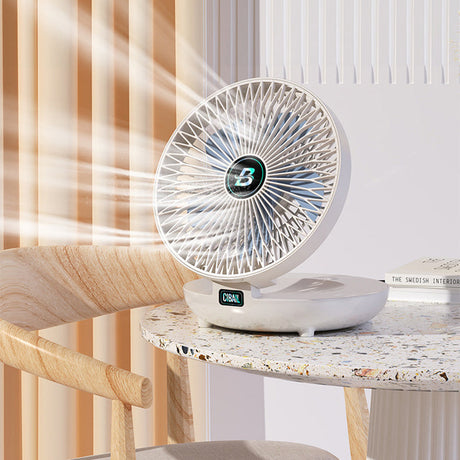 Portable fan on desk or table delivering powerful targeted cooling breeze.
