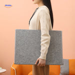 Compact foldable leg warmer designed for easy transport and storage.