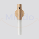 Professional product shot of white motion-activated portable LED lamp.