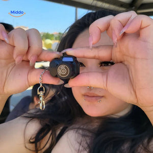 Lightweight portable video camera held in student's hands for quick recording