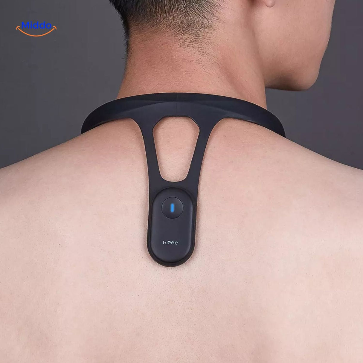Posture corrector neck band worn on user showing sleek, invisible design in everyday wear.