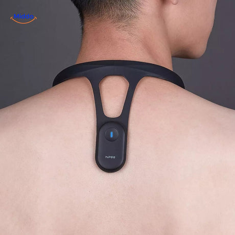 Posture corrector neck band worn on user showing sleek, invisible design in everyday wear.