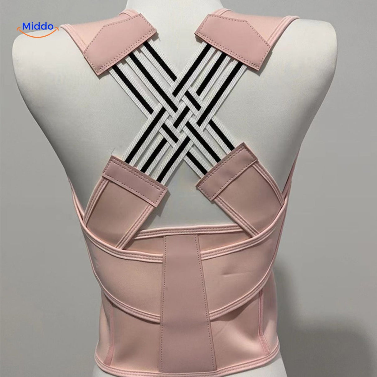 Posture corrector in pink color option, showing the full brace design and adjustable strap system.