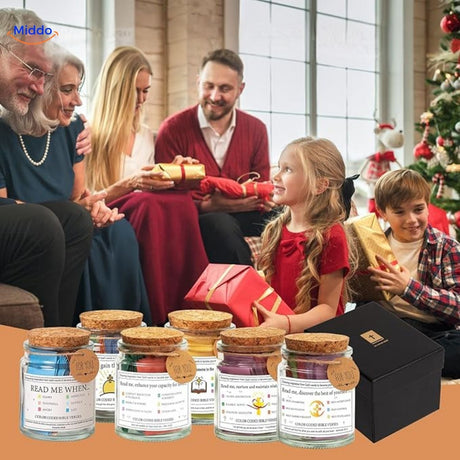 Family exchanging Christmas gifts with inspirational prayer jars displayed in foreground.