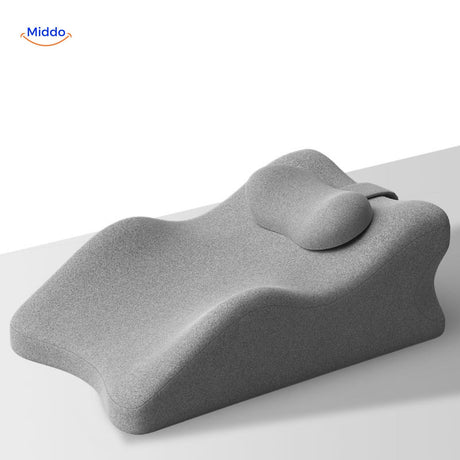 Grey elevation pillow with combined leg and head support for pregnancy comfort.