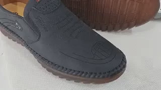 Black Solura loafers leather construction with comfortable slip-on fit.