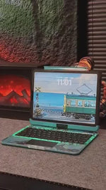 Blue illuminated iPad keyboard case with retro train theme design.