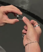 Silver ring watch with adjustable band for perfect custom fit.