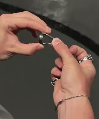 Silver ring watch with adjustable band for perfect custom fit.