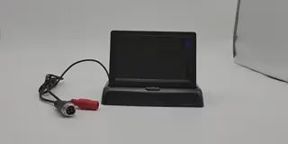 Foldable baby car monitor with cables and simple setup installation.