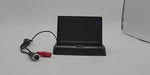 Foldable baby car monitor with cables and simple setup installation.