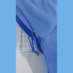 Close-up detail of soft fleece fabric and hood construction