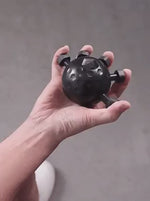 Finger exercises with GripFlex hand strengthener for improved grip power.