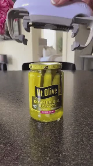 Automatic jar opener handles pickle jars and sealed containers easily.