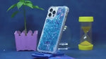 GlowSand phone case blue glitter liquid with sparkle glow-in-dark effect.