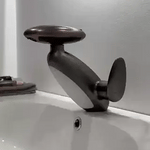 Dark gray pull-out LED bathroom faucet mounted on a countertop in a stylish bathroom setting.