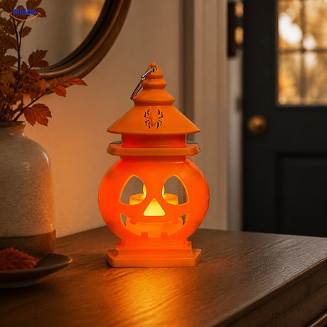 PumpkinGlow™ Castle Warm Glow double-sided Halloween lantern in an entryway