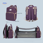Purple diaper backpack with foldable bassinet and available size measurements.