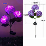 Purple hydrangea solar LED lantern with three flower blooms for garden lighting.