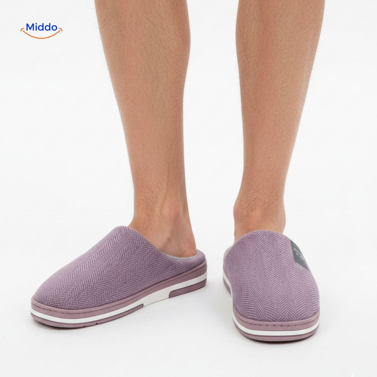 Man wearing purple non-slip cotton slippers, front view model.