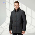 Black quilted jacket with visible pockets and button closures.