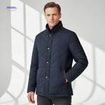 Men's quilted jacket in dark blue with stand-up collar and light background.