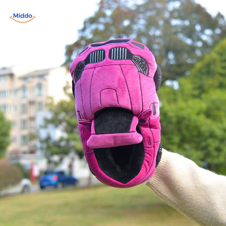 Black car slippers providing plush comfort for relaxing home footwear.