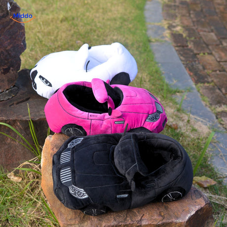 Blue car slippers worn at home showcasing plush comfort for relaxation.