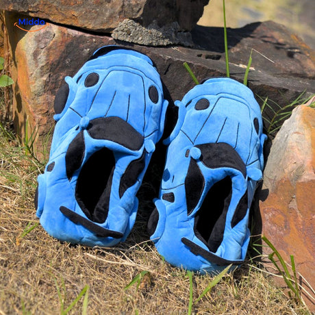 Blue racecar slippers styled for home wear with soft plush materials.