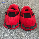 Red car-themed slippers keeping feet warm and cozy indoors.