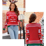 Red knit Christmas sweater with embroidered festive holiday phrase design.