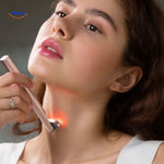 Red light therapy EMS pen in use on face during at-home skincare treatment.