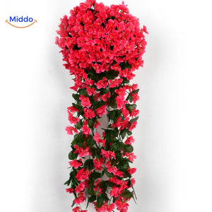 Red artificial orchid flowers with dense cascading petals.