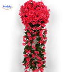 Red artificial orchid flowers with dense cascading petals.