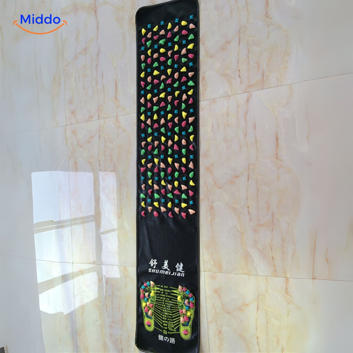 Feet receiving acupressure stimulation on the ReflexoStep therapeutic mat.