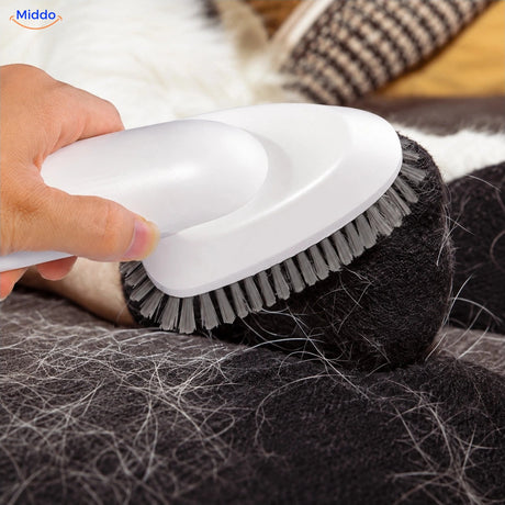 Removing loose pet hair from fabric with Furiva