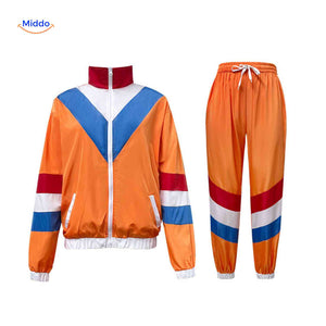 80s retro tracksuit jacket and pants with sporty design.
