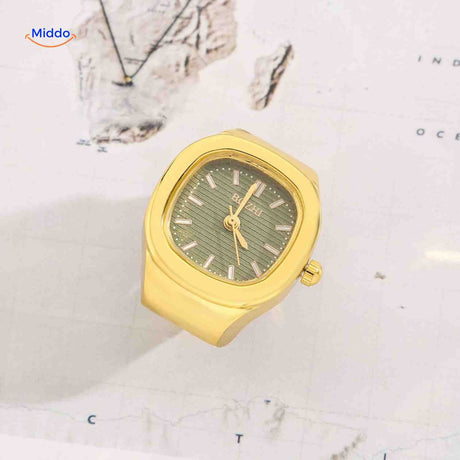 Gold ring watch with green square dial.