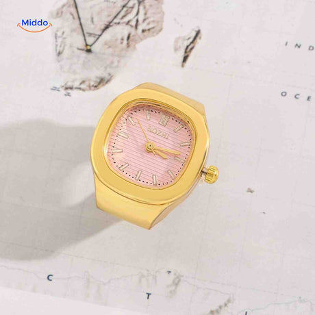 Gold ring watch with pink square dial.