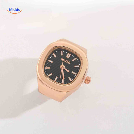 Rose gold ring watch with black square dial.